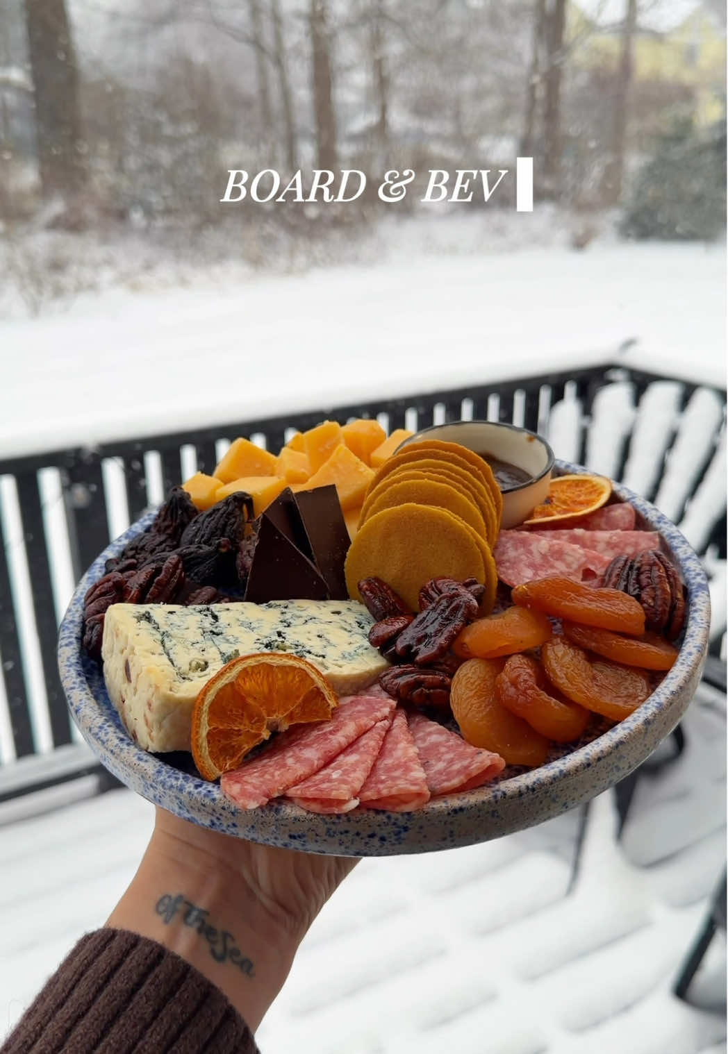 TikTok post by @thatcheeseplate for High Camp Flasks. Caption reads: BOARD + BEV PAIRING: smoky maple whisky sour....