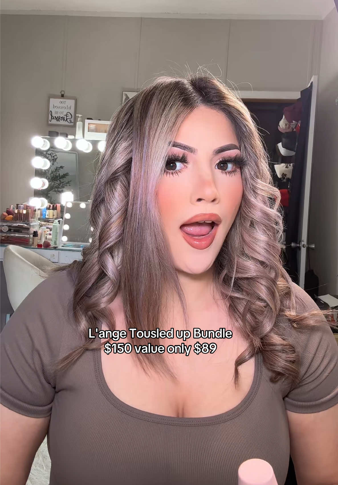 TikTok post by @lupitv336 for L’ange Hair. Caption reads: [...] quality curls at home 😍 #lepirouette....