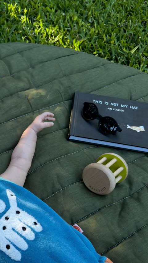 Instagram post by @sundaybooks_ for Polarised Baby Sunglasses. Caption reads: River’s first pair of sunnies from Buki Baby 🌞....