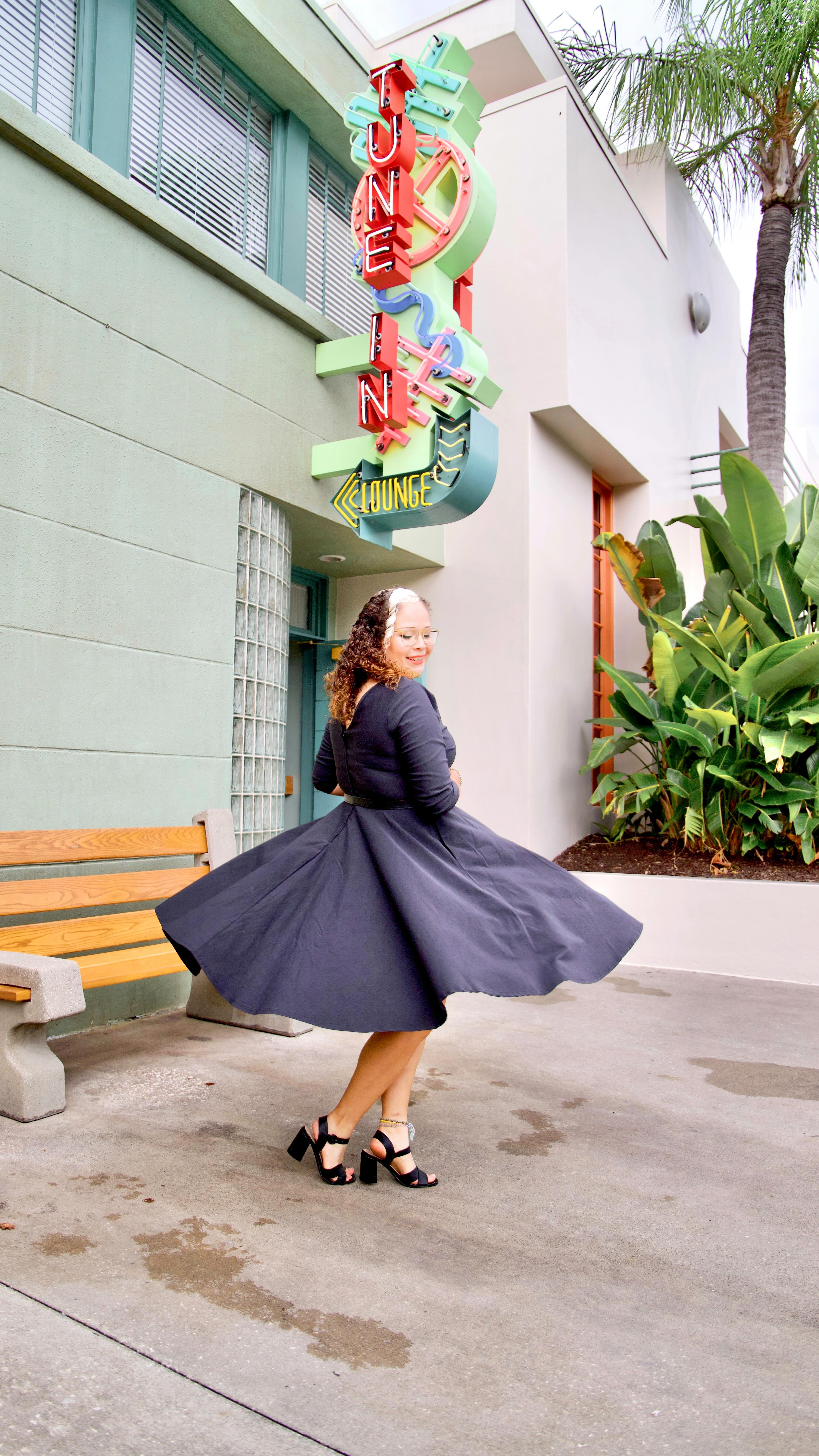 Instagram post by @oliviaandcompany_ for Unique Vintage. Caption reads: I’m twirling non-stop in this dress....