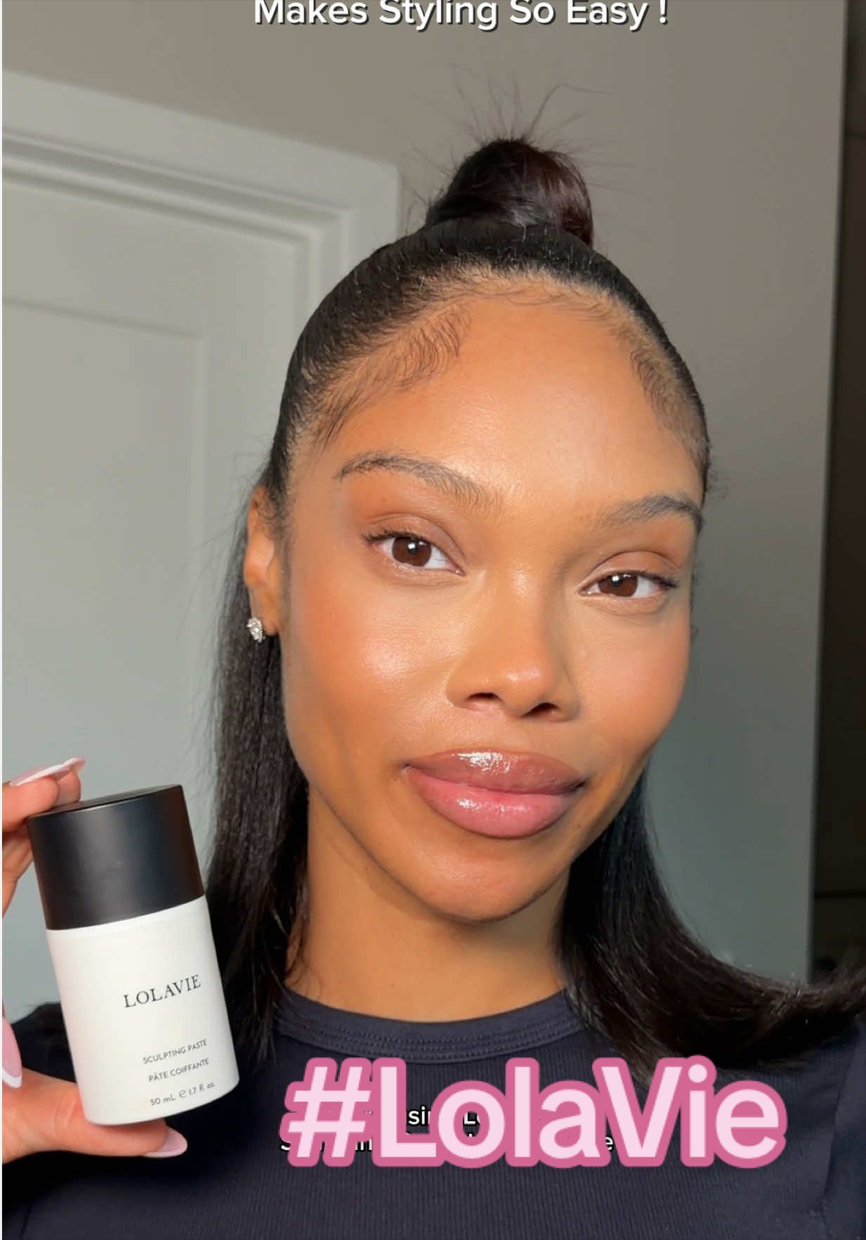 TikTok post by @briannagiscombe for LolaVie. Caption reads: LolaVie’s Sculpting Paste gives you sleek shine....