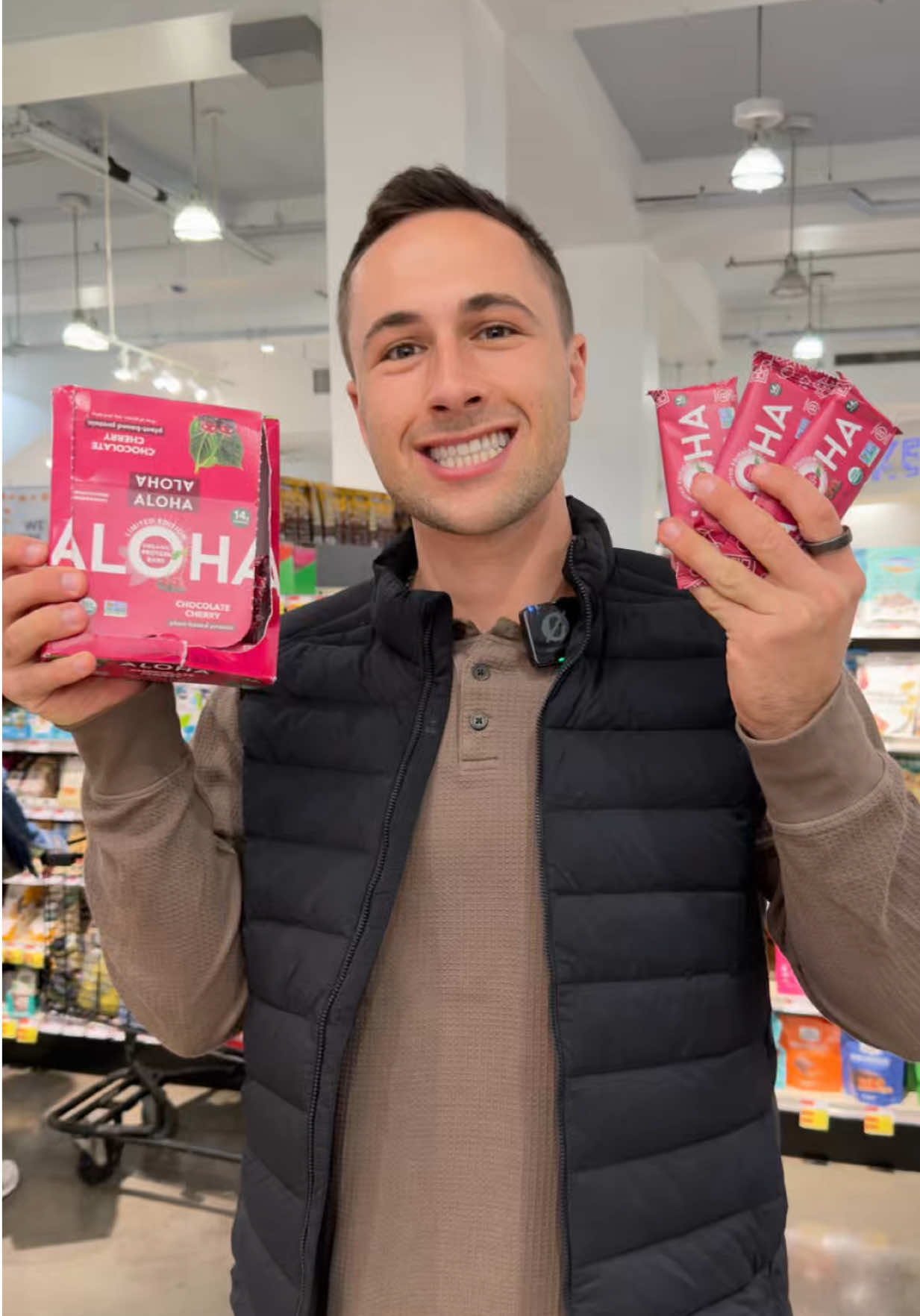 TikTok post by @healthwithhunter for ALOHA. Caption reads: [...] Foods to grab a protein bar, and I found....