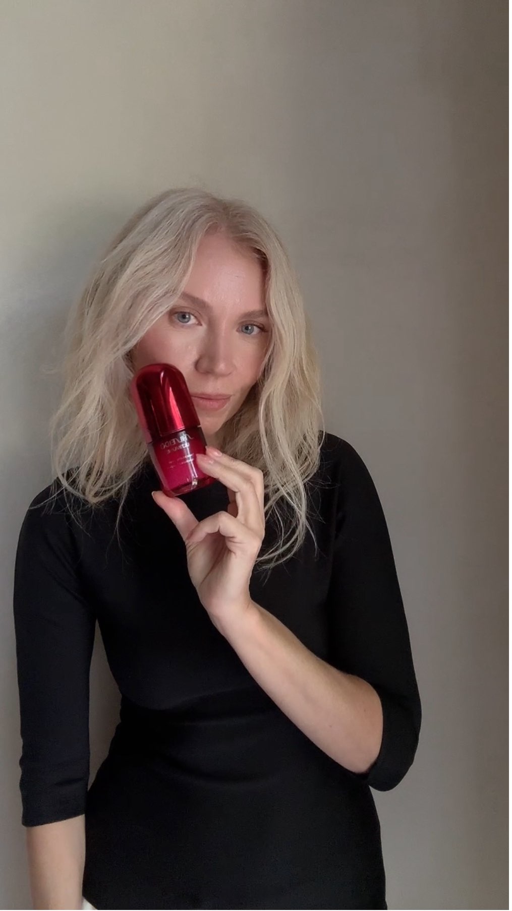 Instagram post by @simplyyuls for SHISEIDO. Caption reads: Try the NEW Shiseido Ultimune Serum to Slow your....