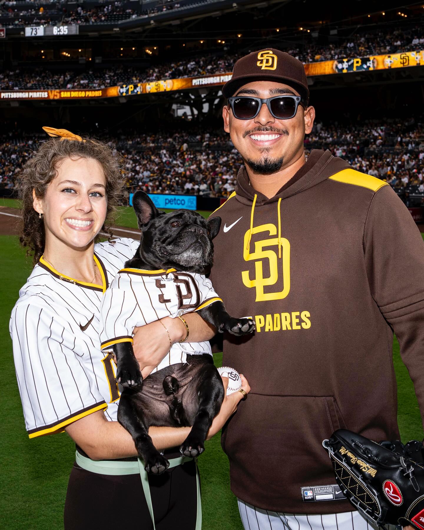 Instagram post by @padres for Petco. Caption reads: A pawfect Ceremonial Furst Pitch 🥰.