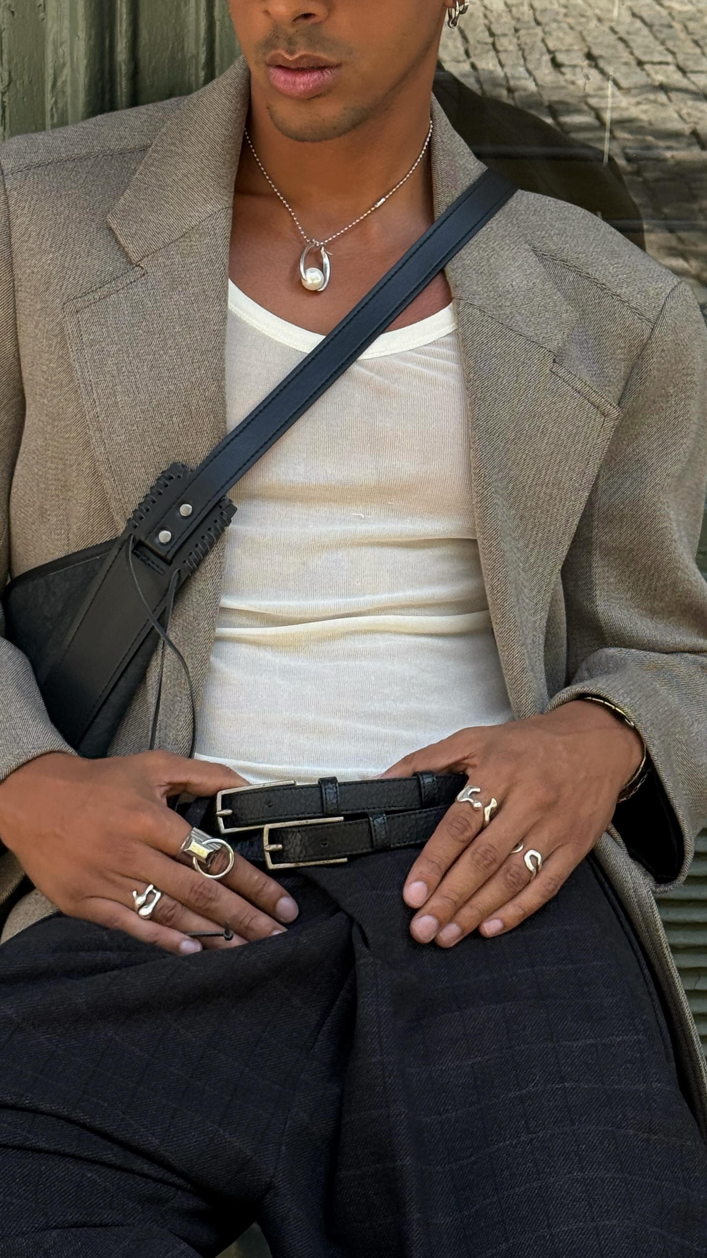 Instagram post by @touchangel for Away. Caption reads: Small in size big on style @away 😏 #awaypartner.