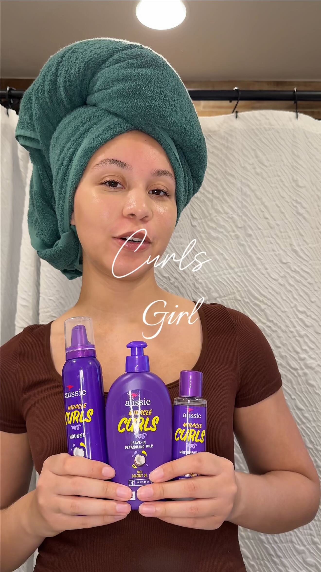 Instagram post by @allthingsamorii for Aussie Hair. Caption reads: Once a curls girl, always a curls girl ✨ #ad....