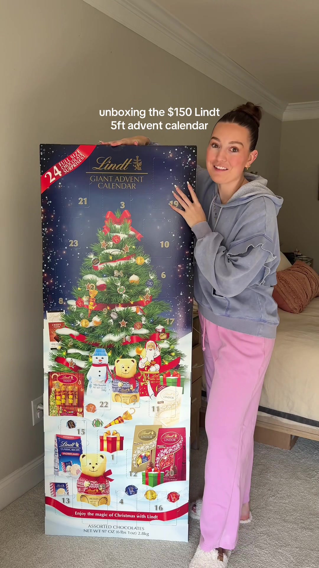 TikTok post by @sarahlynnrain for Lindt. Caption reads: [...] guys voted yes to me unboxing the $150....
