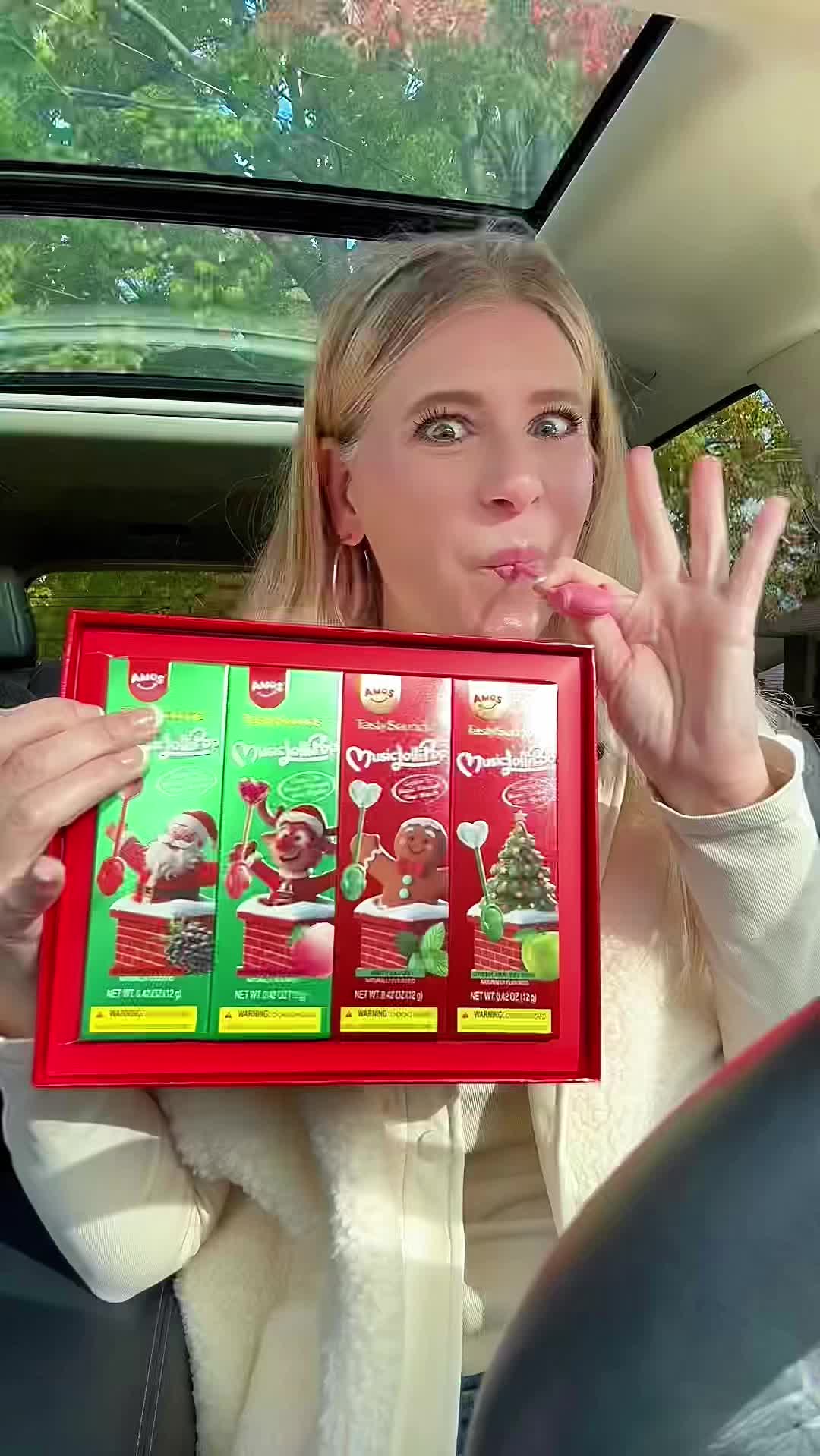 TikTok post by @iamsarahtonin for Amos Sweets. Caption reads: [...] HERE! Check out the 🛒 for @Amos Sweets....