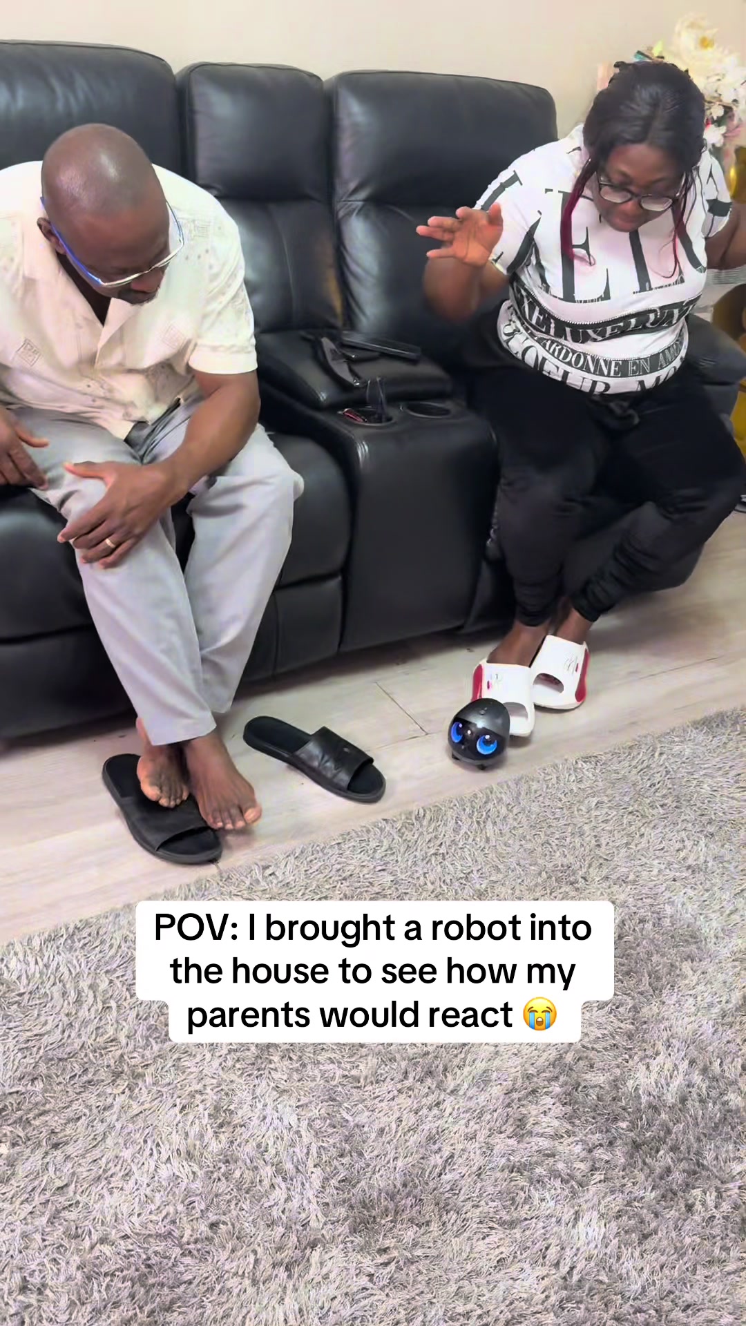 TikTok post by @amosthakid for Enabot. Caption reads: Why were they scared😂 #enabot #african #parent....