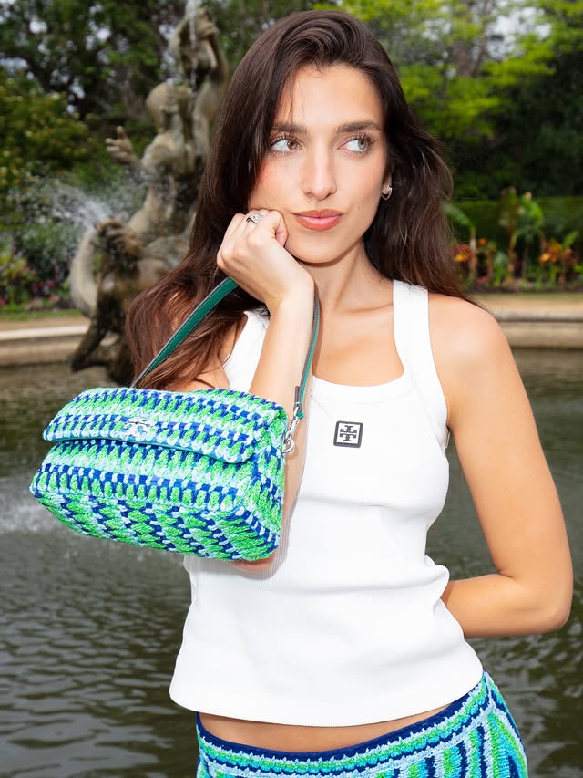 Instagram post by @rinalipa for Tory Burch. Caption reads: city girl summer @toryburch ad.