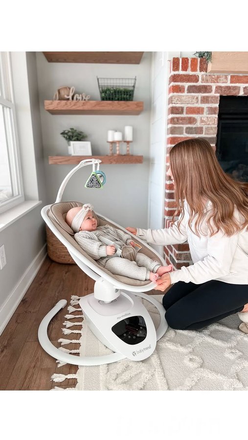 Instagram post by @mrskatiecarlson for Baby Trend. Caption reads: [...] link! 🔗 The remote control. 🤌🏼 Our....