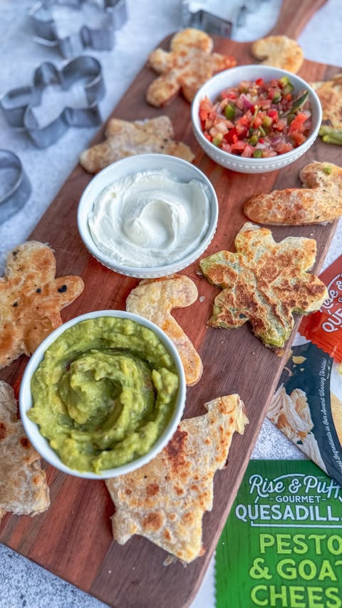 Instagram post by @makefoodlovely for Rise & Puff. Caption reads: 🌮 🎄 HOLIDAY QUESADILLA BOARD 🎄 🌮 

Hey moms....