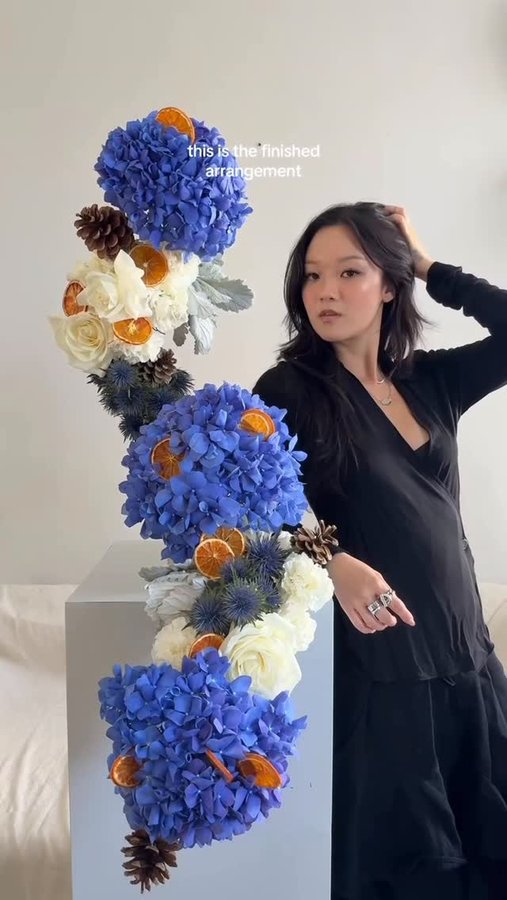 Instagram post by @seeking_floral_arrangements for Politics and Prose. Caption reads: Ever wondered what Glacia looks like? ❄️💐

We....