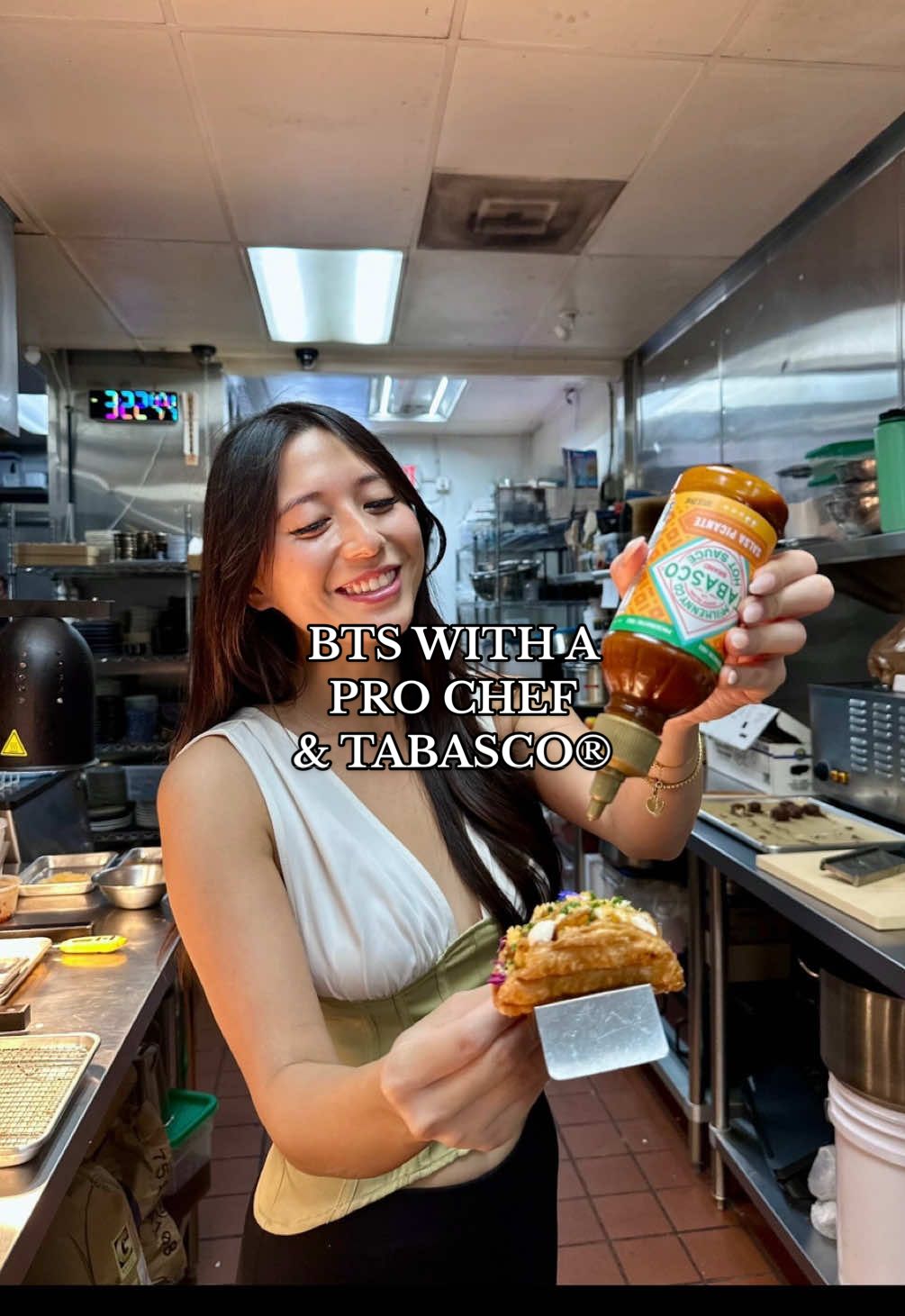 TikTok post by @thespicyjuju for TABASCO. Caption reads: BTS with a Professional Chef & @TABASCO BRAND 🌶️....