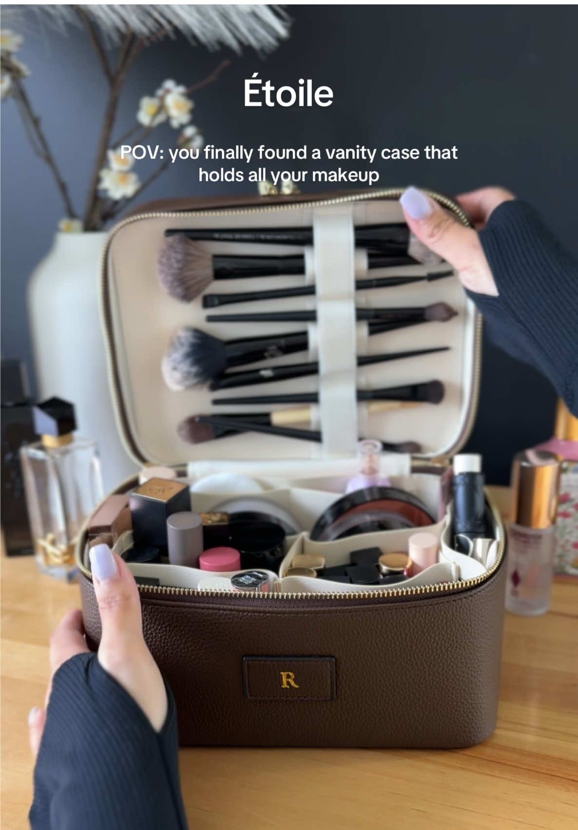 TikTok post by @raqinchitown for Etoile. Caption reads: The most beautiful vanity case 😍 @ETOILE US....