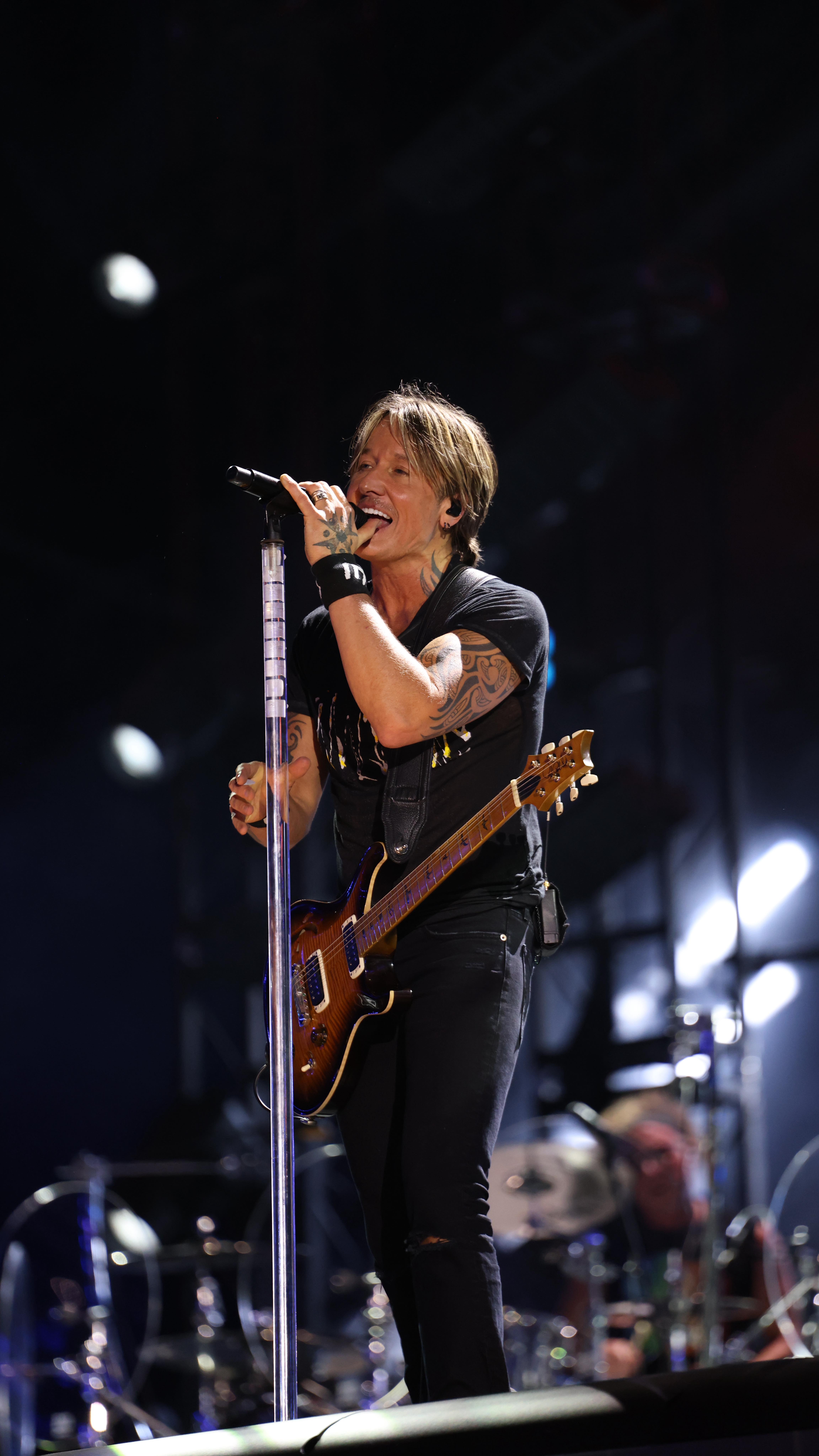 Instagram post by @keithurban for SOFI. Caption reads: this life is a dream with @KeithUrban

#CMAfest....