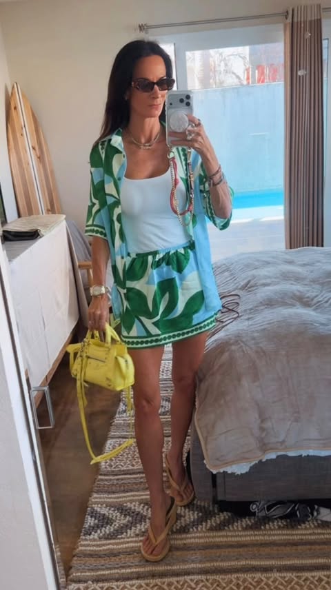 Instagram post by an influencer for REVOLVE. Caption reads: [...] #VacationStyle #MatchingSet....