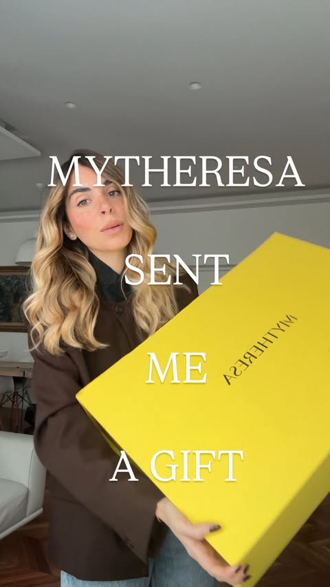 Instagram post by @elenagiadaa for Mytheresa. Caption reads: [...] worry! Just me and my @goldbergh 🧸⛷️....
