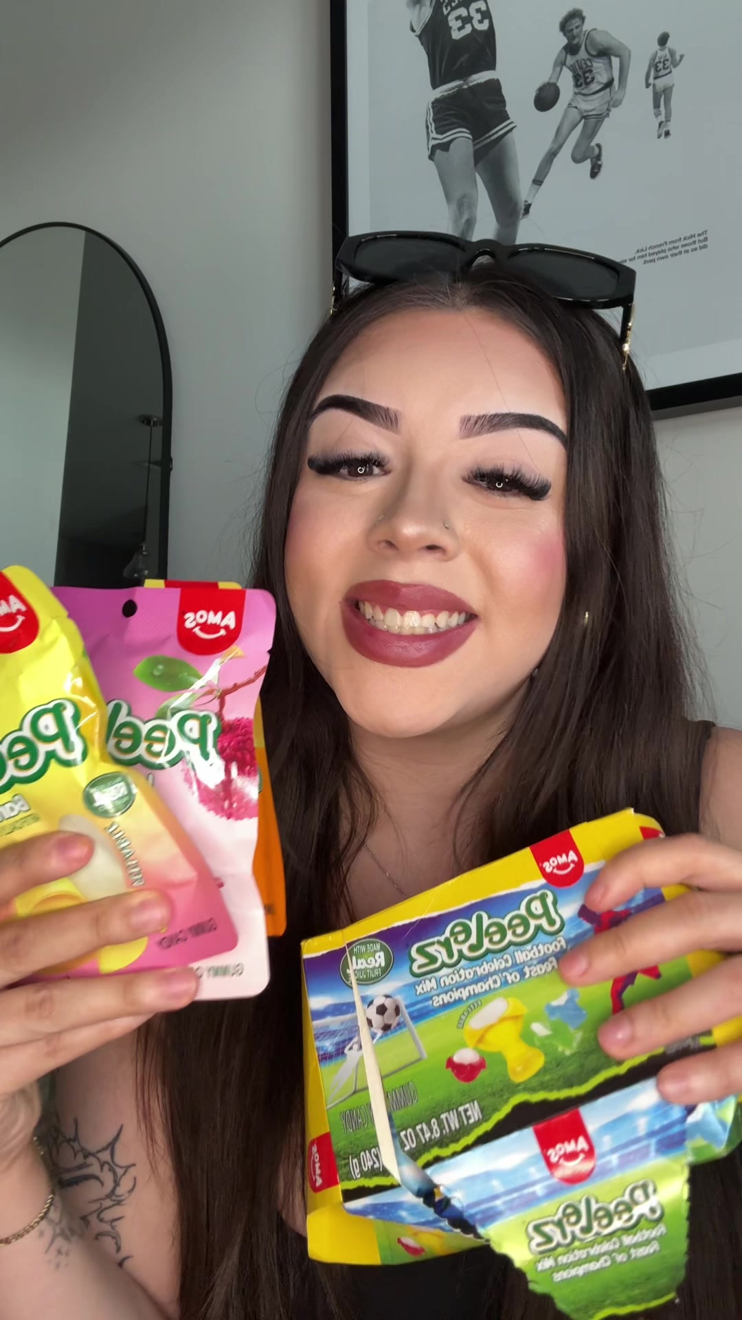 TikTok post by @val4hunnid for Amos Sweets. Caption reads: [...] 🍭 Thank you for sending these over! @Amos....