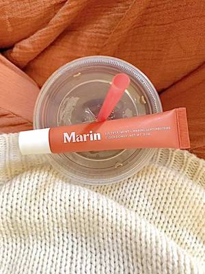 TikTok post by @a_user765 for Marin Skincare. Caption reads: the lip treatment of the fall🍎🍂 @Marin Skincare....