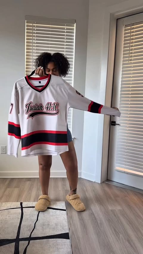 Instagram post by @confidently__beautiful for Fansidea. Caption reads: Details of my Jersey:

Scripture• Isaiah 41:10 “So....