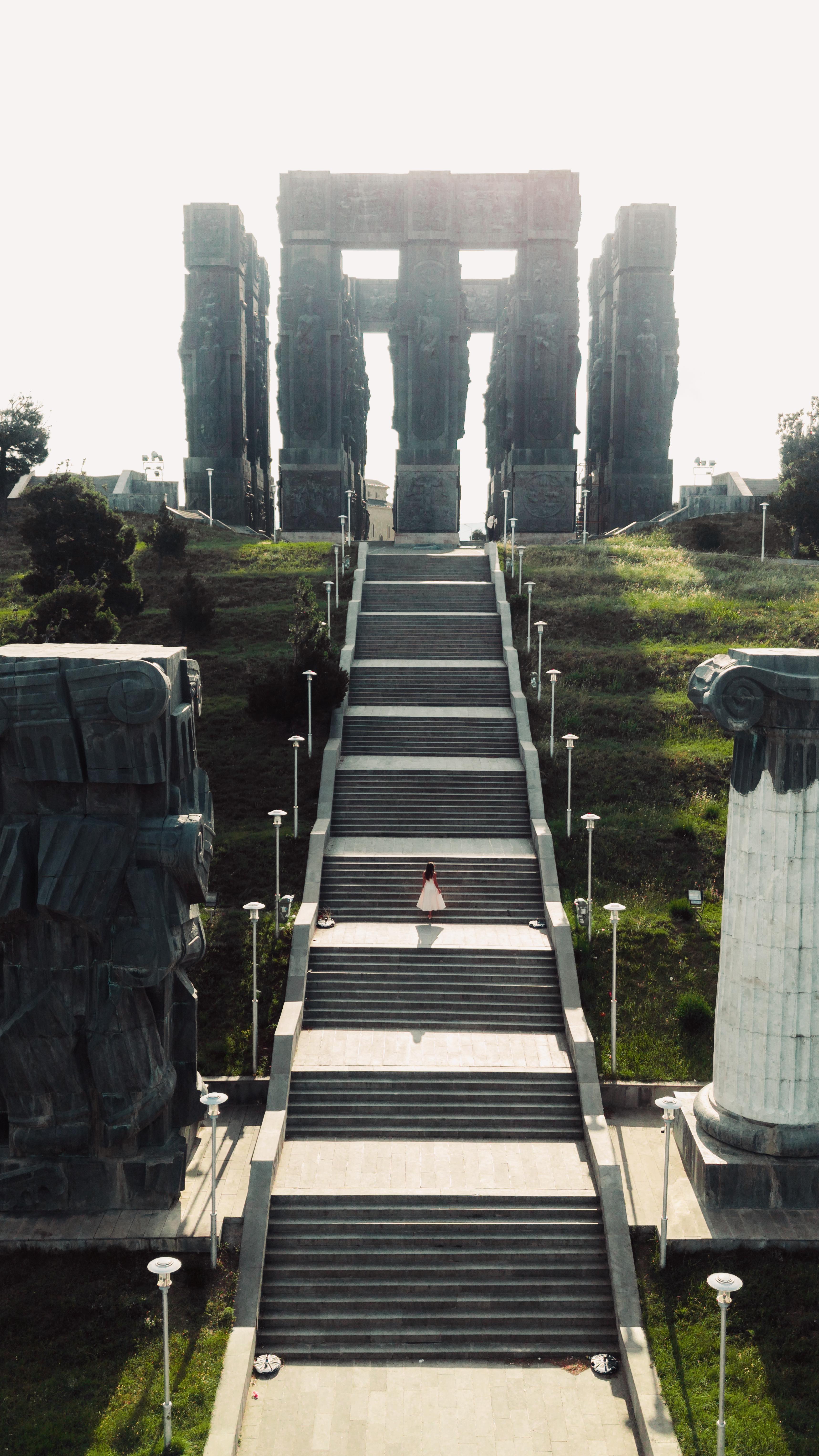 Instagram post by @camelia.beresteanu for Radisson. Caption reads: Every corner of Tbilisi feels like a story waiting....