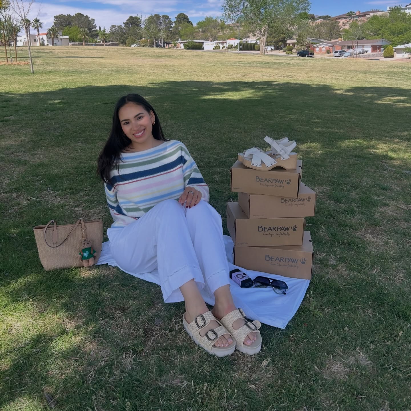 Instagram post by @thesylvana for BEARPAW. Caption reads: Stepping into spring with my comfy @bearpawshoes....