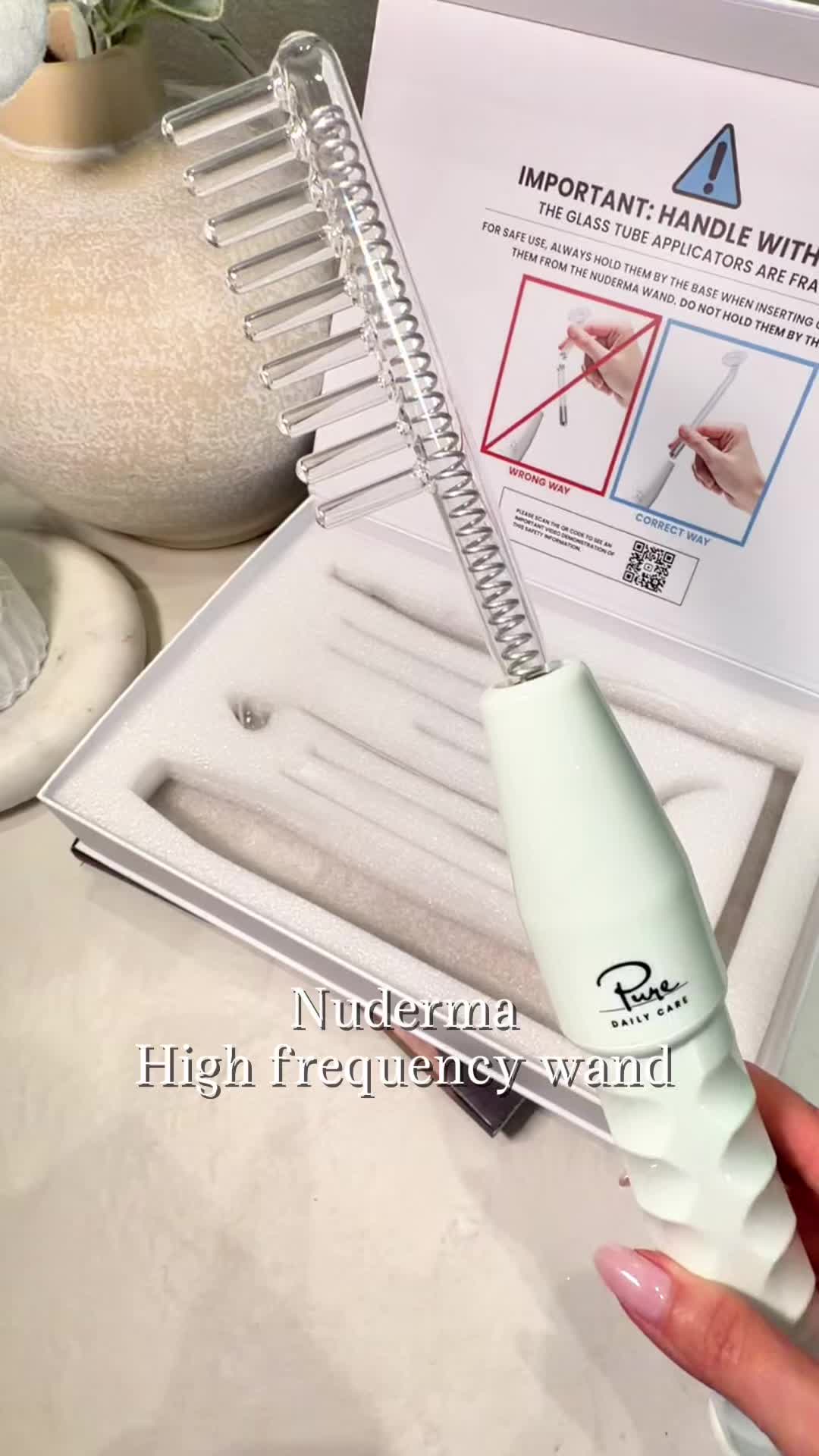 TikTok post by @charlielifestyle_ for Pure Daily Care NuDerma Wand. Caption reads: @Pure Daily Care NuDerma Wand High frequency wand....