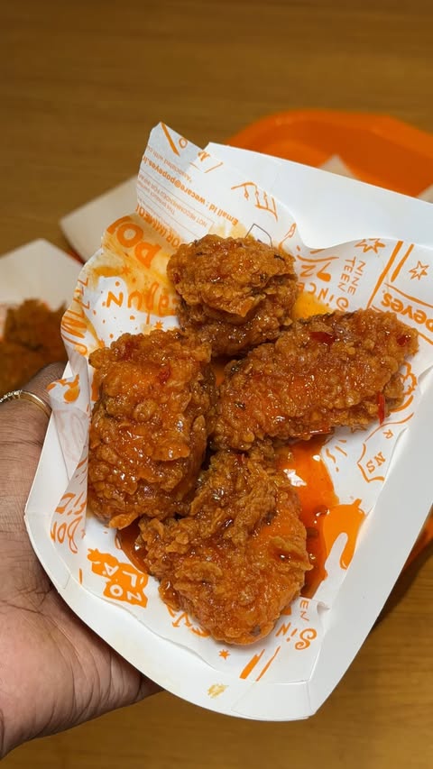 Instagram post by @nivesfoodflavour for Popeyes. Caption reads: [...] chicken plans just got an upgrade! 🍗🔥....