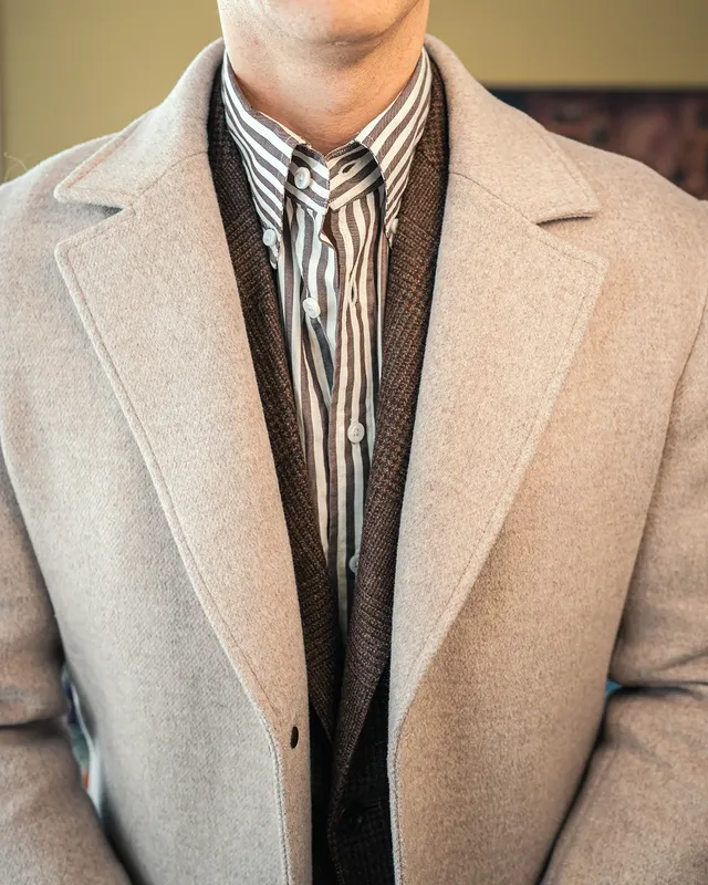Instagram post by @smalltowndapper for Proper Cloth. Caption reads: [...] : Sport Coat : Glencheck brown by....
