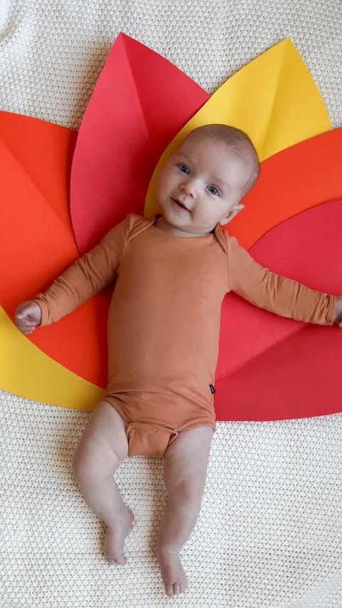 Instagram post by @lovethelunas for Kyte Baby. Caption reads: Thanksgiving photos to take of your baby this....