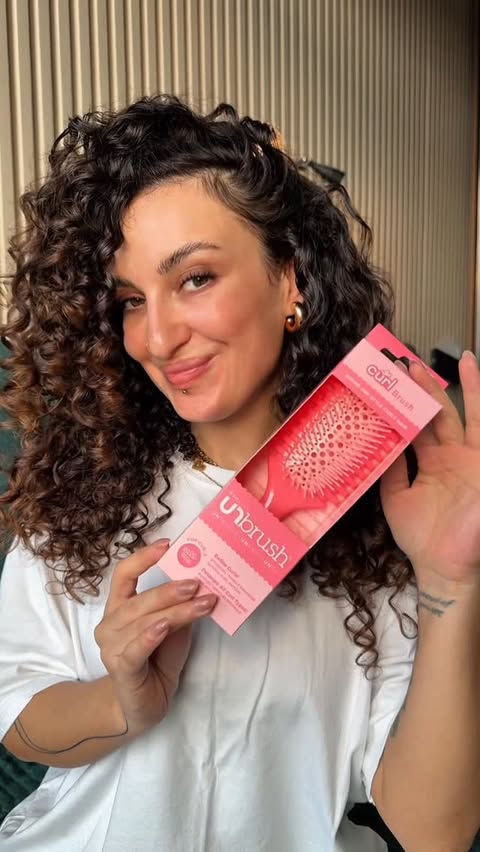 Instagram post by @nuki.rorry for FHI Heat. Caption reads: [...] newest UNbrush ✨ The UNbrush Curl by....