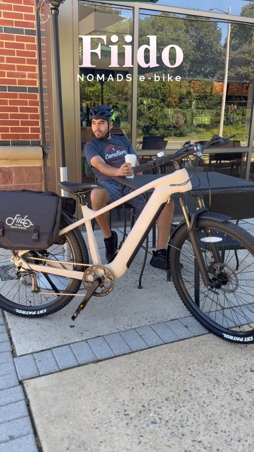 Instagram post by @brigitteilkaysavran for Fiido. Caption reads: Adventure meets innovation with the Fiido Nomads....