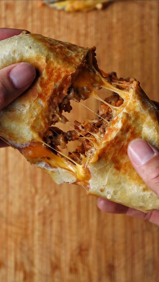 Instagram post by @platesbykody for Minute Rice. Caption reads: A walking taco is usually a bag of chips, but a....