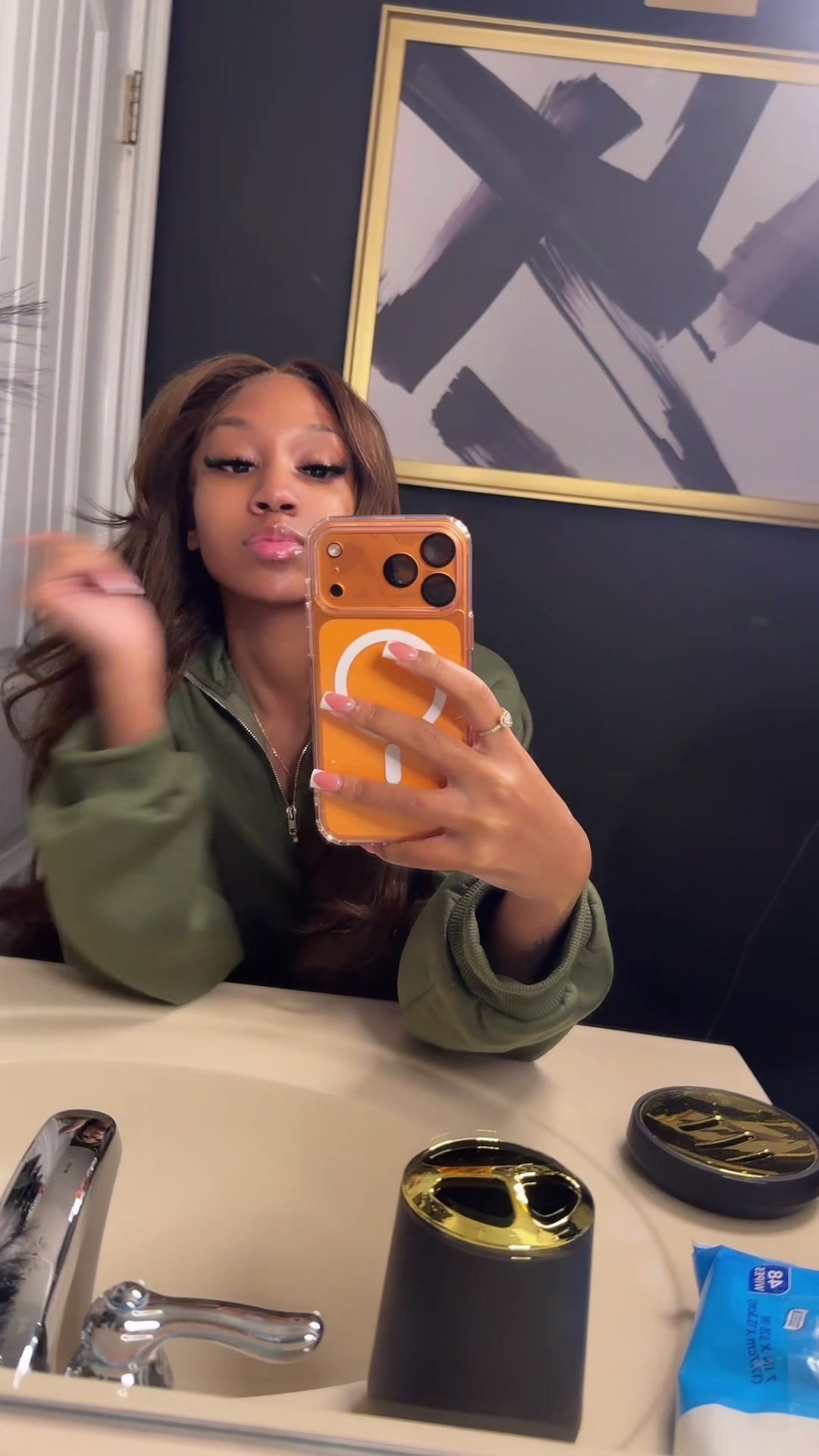 TikTok post by @theereallniya for Sterly Hair. Caption reads: [...] chocolate brown body wave wig from....
