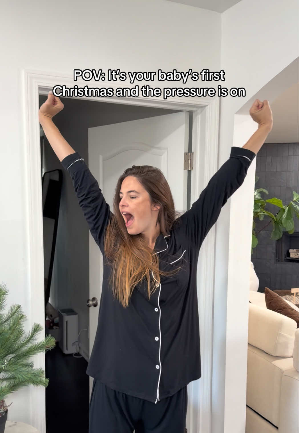 TikTok post by @samanthaswanson1 for Momcozy. Caption reads: Baby’s first Christmas = GO TIMEEEEE 🤪🤸🏻‍♀️🎁....