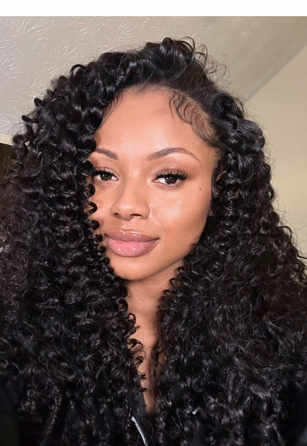 TikTok post by @quincybatson for Curlyme. Caption reads: [...] me a good put it on and go type of wig....