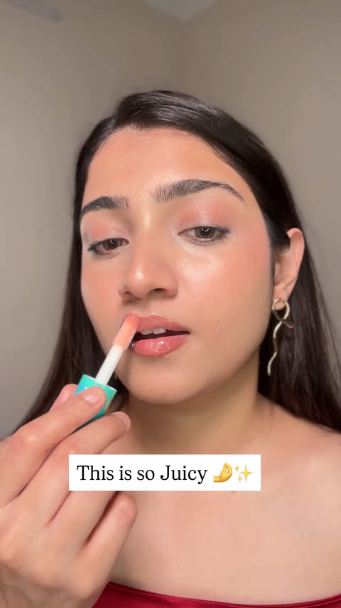 Instagram post by @chandni11jan for Lovechild. Caption reads: [...] shine with my Lip Gelato lip oil from....