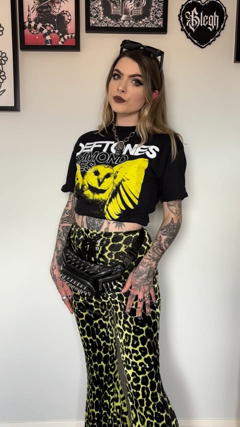 Instagram post by @bethanshakey for Damaged Society. Caption reads: [...] to wear than band tees🤩 Tee* -....