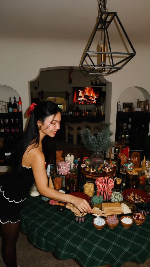 Instagram post by @misstiffanyma for Evite. Caption reads: [...] the finished gingerbread houses?? 🎄🍭....