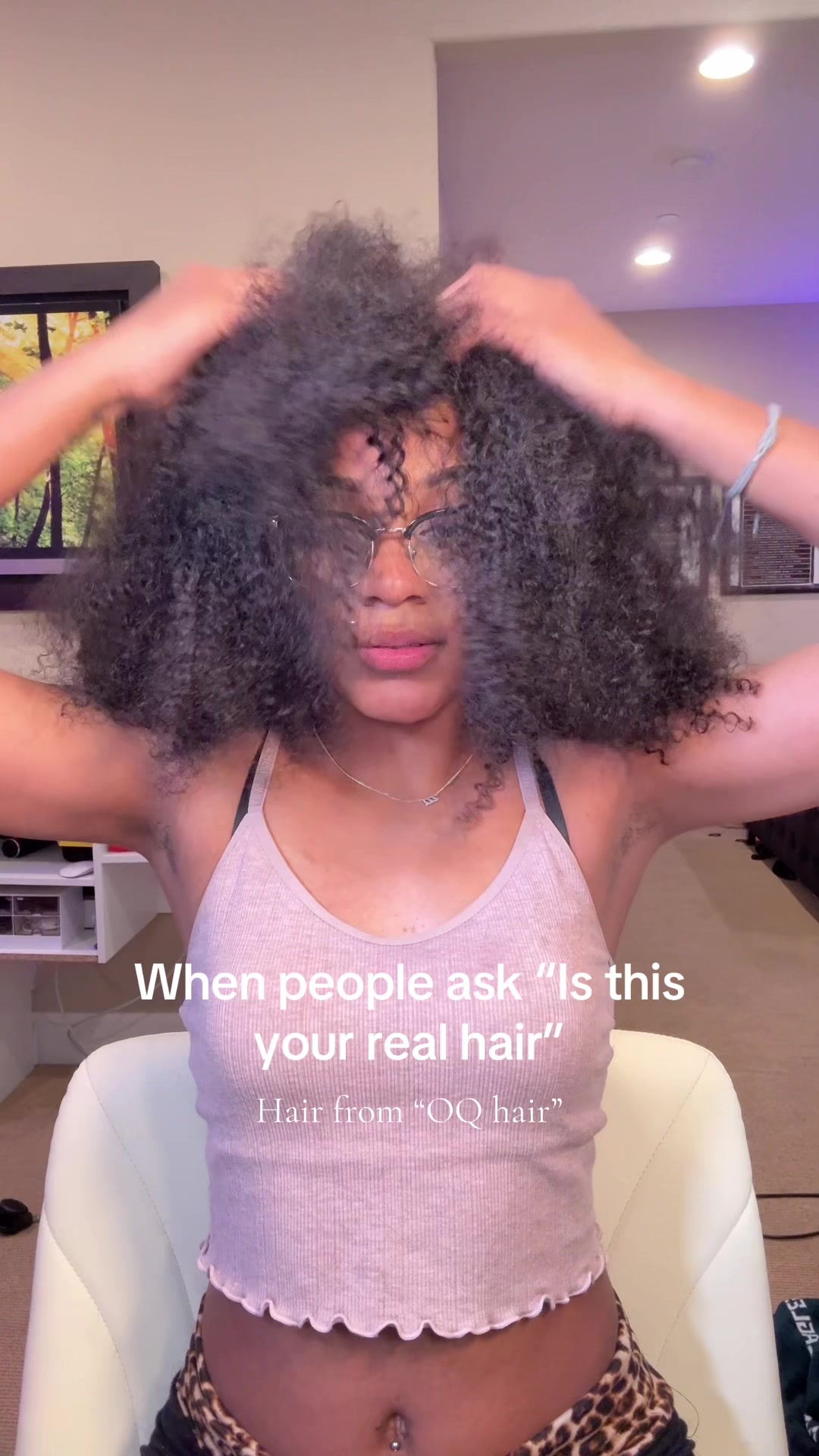 TikTok post by @yrbnyla for OQHAIR. Caption reads: Hair from @OQHAIR #halfwig #curlyhair .