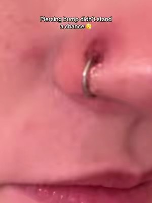TikTok post by @threedayshope for Base Laboratories. Caption reads: [...] #piercingbump #halloween @Base Laboratories.