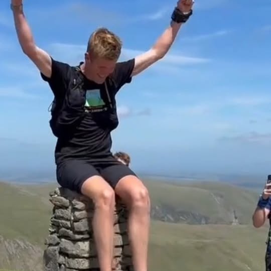 Instagram post by @mindomountains for JustGiving. Caption reads: Every mountain in England & Wales = COMPLETE!....