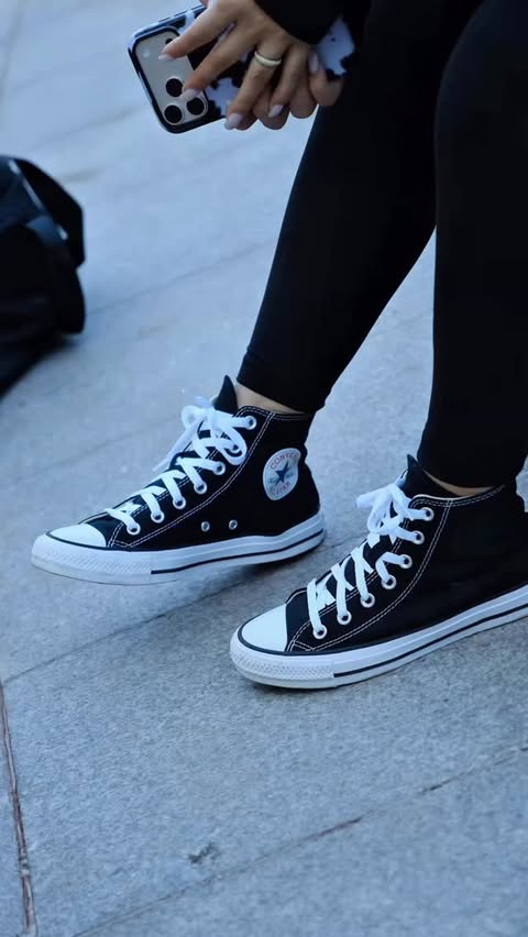 Instagram post by @ekaterine.tugushi for Converse. Caption reads: Sneakers: @converse 🤍 Matching Set: @lululemon 🖤....