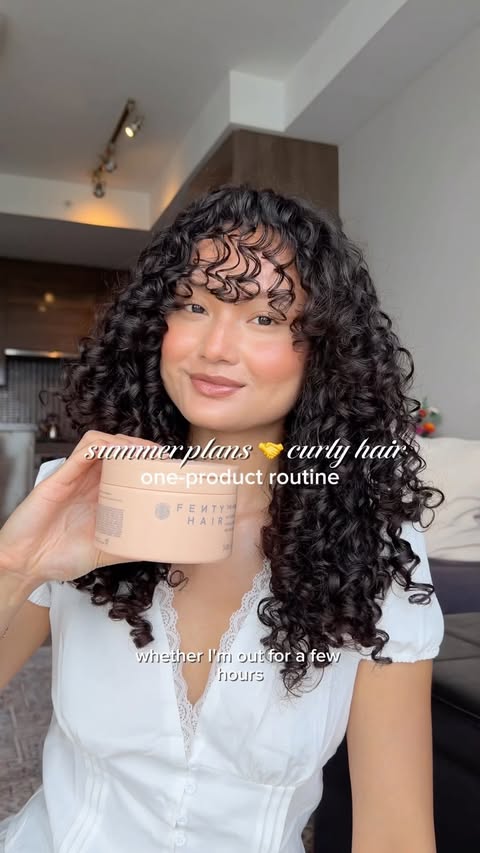 Instagram post by @rach.yim for Fenty Hair. Caption reads: suns out, curls out 💛 #FentyHairPartner....