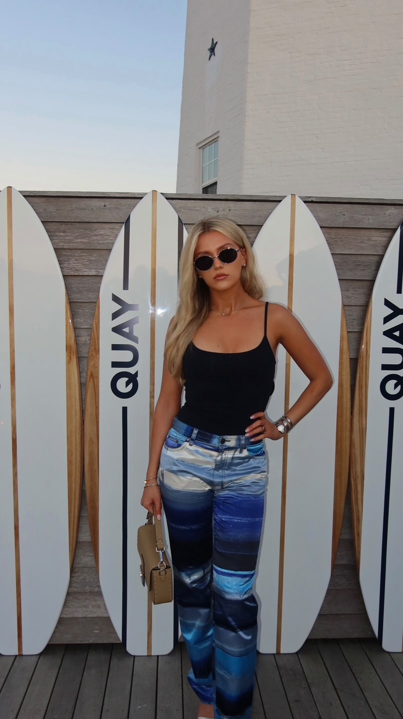 Instagram post by @chloemarkss for QUAY. Caption reads: [...] the vibe 😎Loving Felt Cute and Hyped Up....