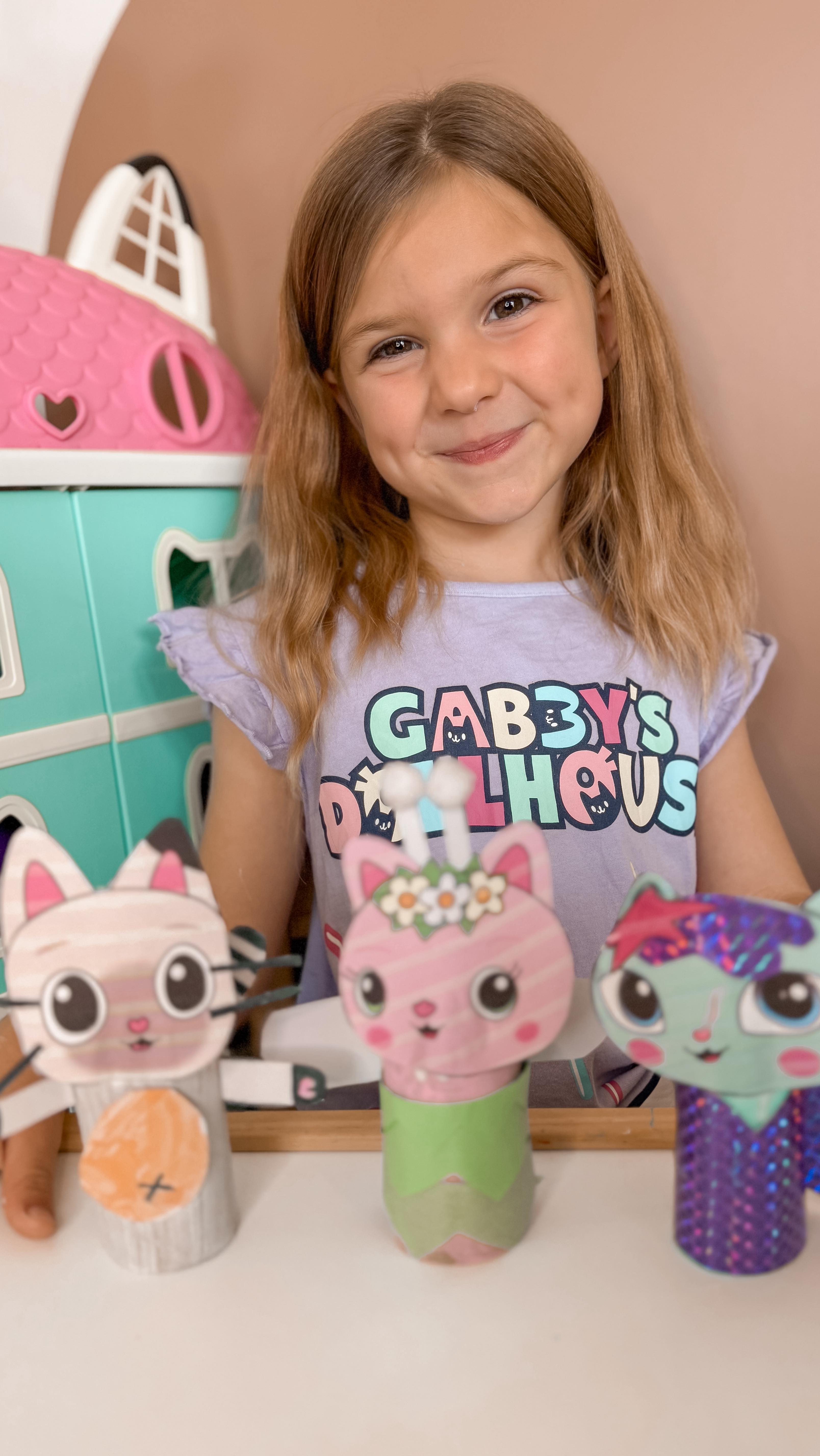 Instagram post by @rosie_nicholls for Baker Ross. Caption reads: Gabby’s Dollhouse x Baker Ross 🐱🌈
 
niamh is....