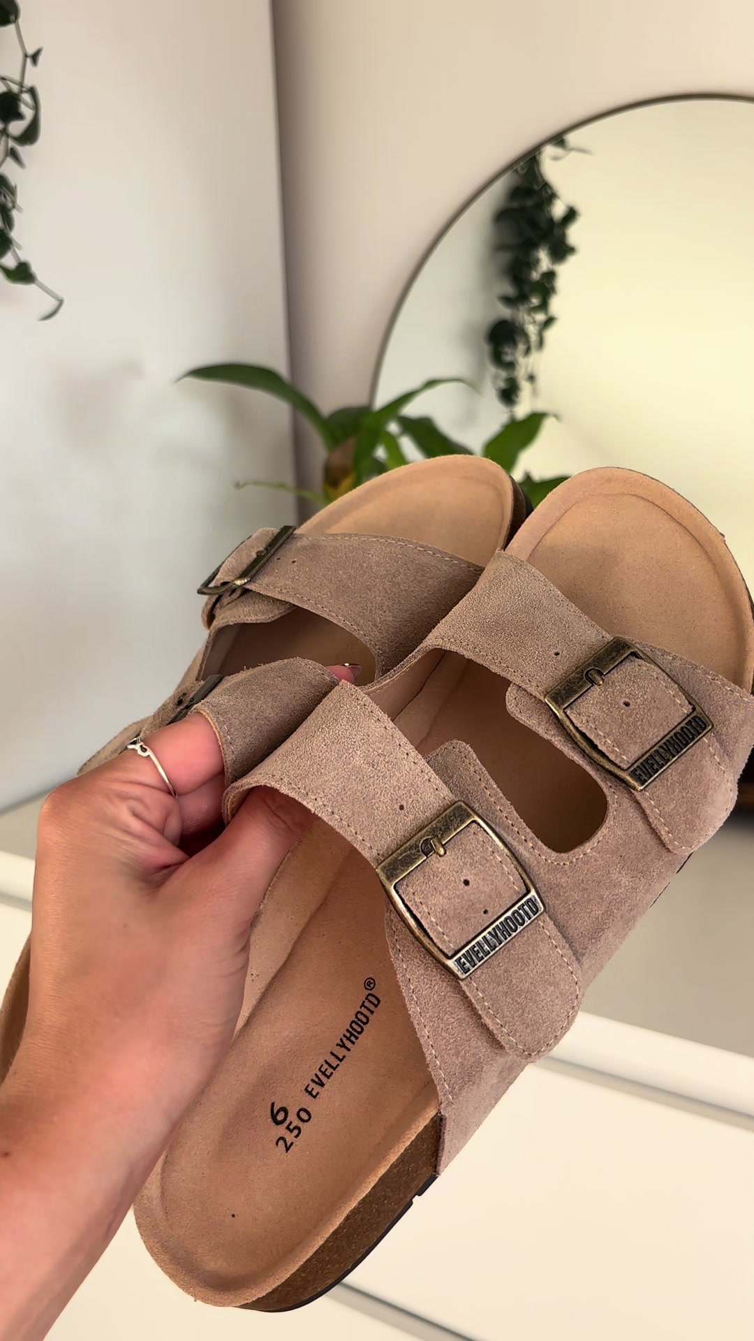 TikTok post by @laurenmclinden for Evellyhootd. Caption reads: How STUNNING is this colour 🤎 #evellyhootdsandals....