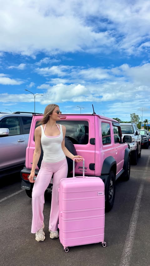 Instagram post by @_jadeebonymorris for American Tourister. Caption reads: American Tourister sent me this beautiful suitcase....