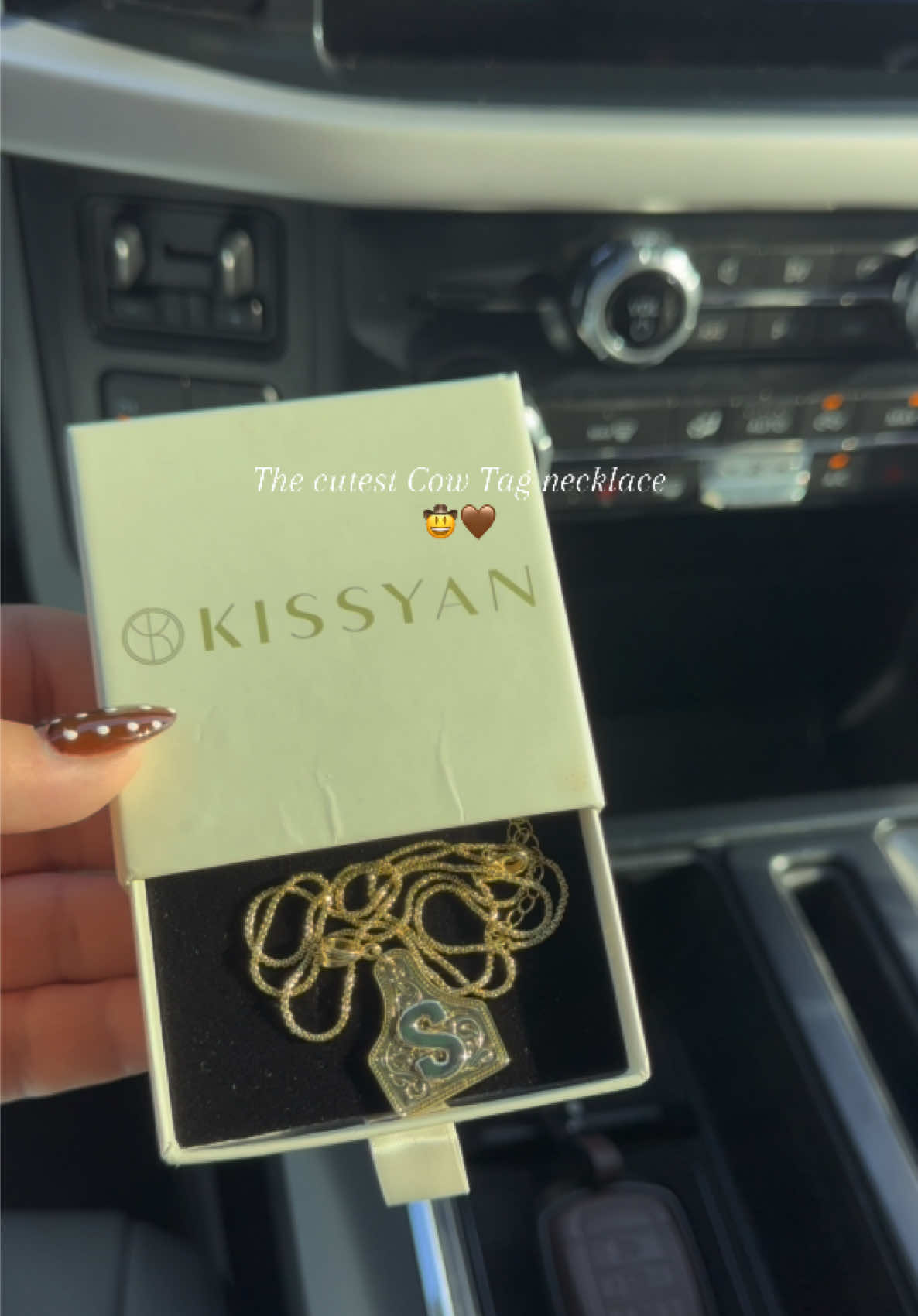 TikTok post by @rossflst for KissYan Jewelry. Caption reads: The perfect gift 💝 from @KissYanOfficial 🤎....